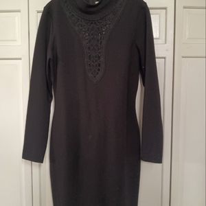 Sexy black dress with lace cut out. Size L.